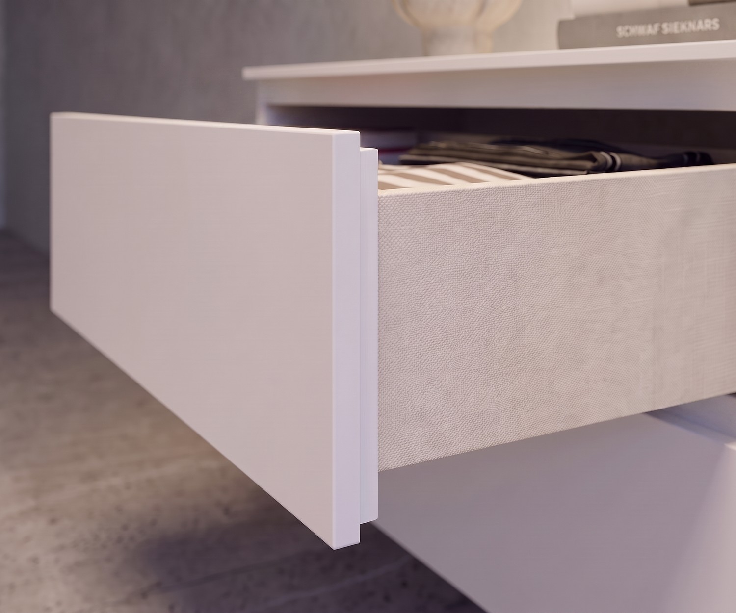 Cassettiera sospesa Easy con interno effetto tessuto Cassettiera sospesa Easy Novamobili con cassetto aperto, interno con effetto tessuto, design minimalista bianco opaco