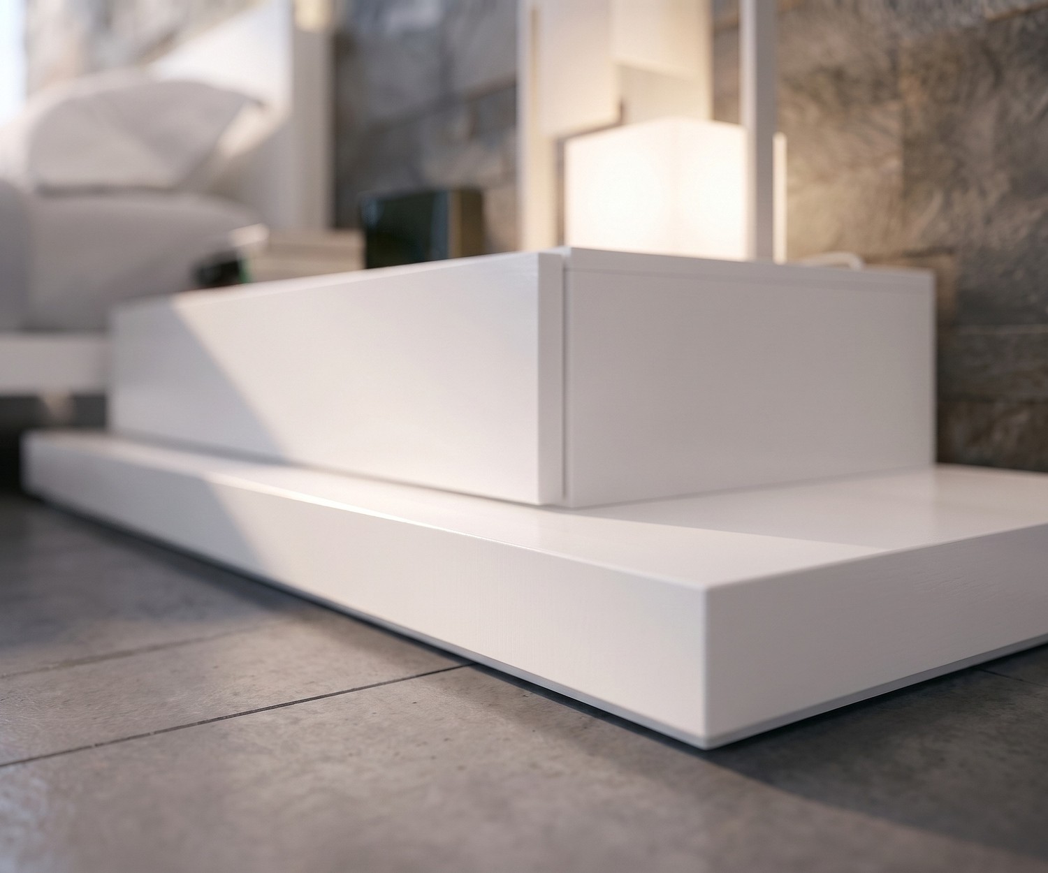 Zoccolo bianco Livitalia EASY Zoccolo Livitalia EASY come piedistallo TV bianco e base da comodino in una camera da letto moderna.