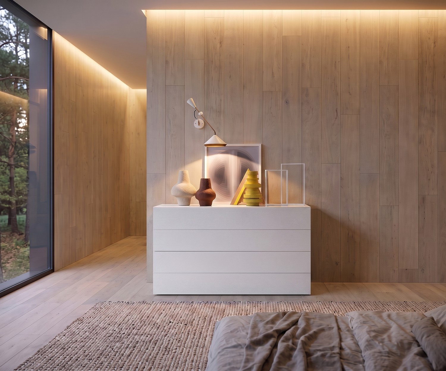 Comò Novamobili Easy a 4 cassetti bianco opaco Comò Novamobili Easy a 4 cassetti per la camera da letto, in bianco opaco davanti a una moderna parete in legno.