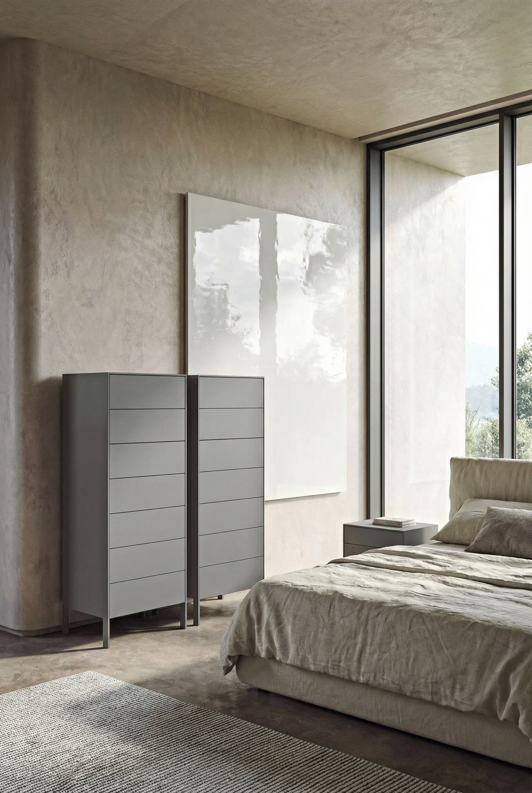 Cassettiera alta di design lucida in una moderna camera da letto con morbida riflessione della luce.