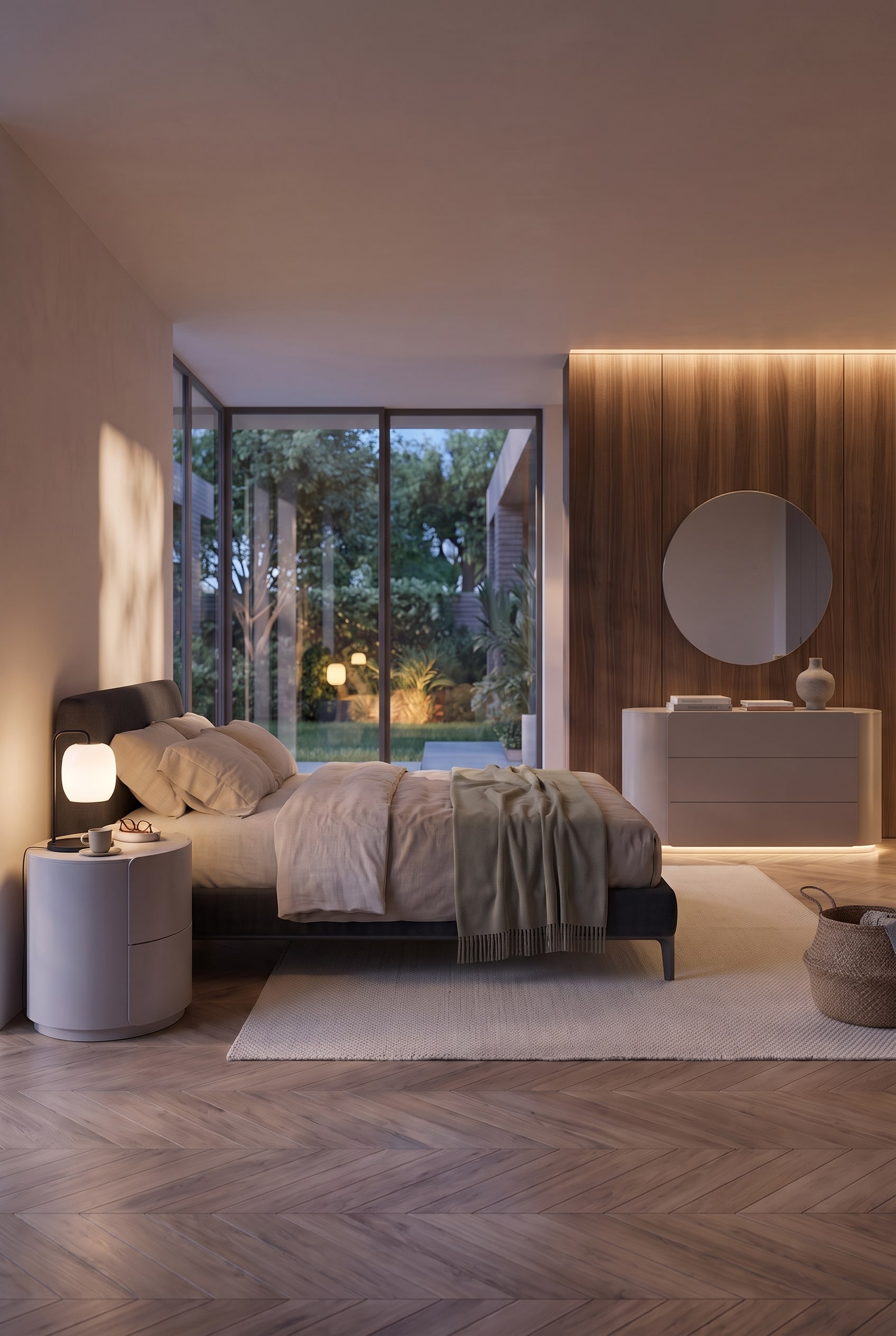 Modernes Schlafzimmer in der Totalen, zeigt runden Nachttisch, Bett und abgerundete Kommode vor Holzpaneelen.