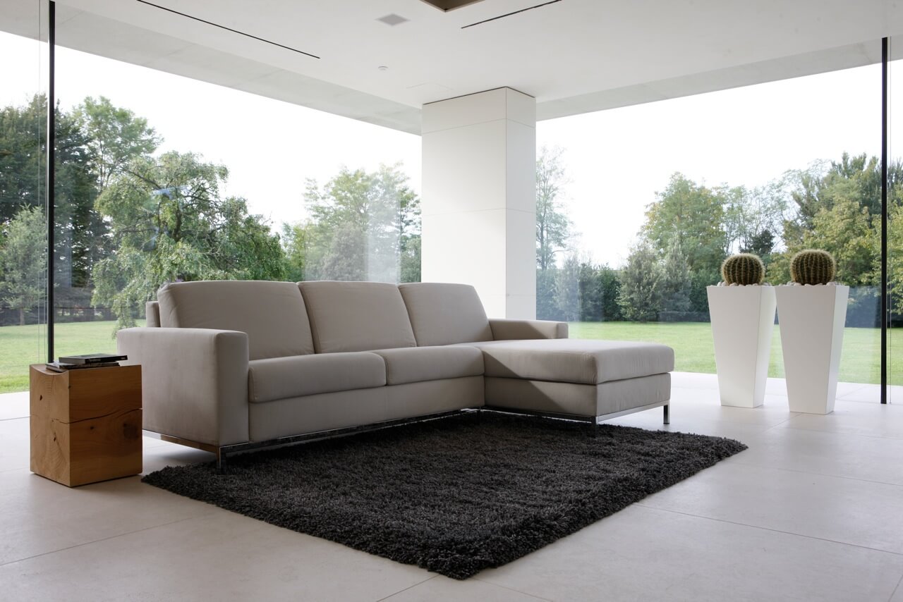 Divano angolare di design con funzione di riposo